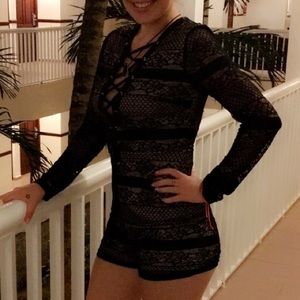 SOLD on MercAri Black And Tan romper